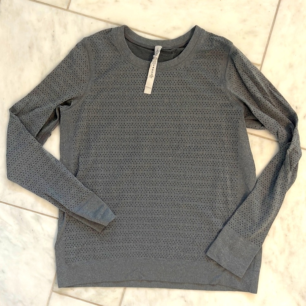 Lulu Lemon Perforated Grey LS atop